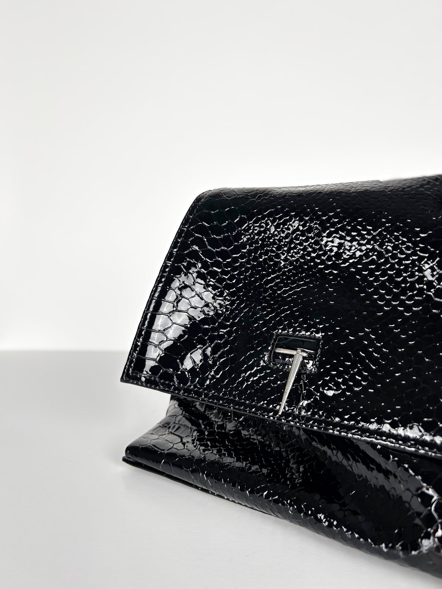 PATENT FOLD OVER CLUTCH