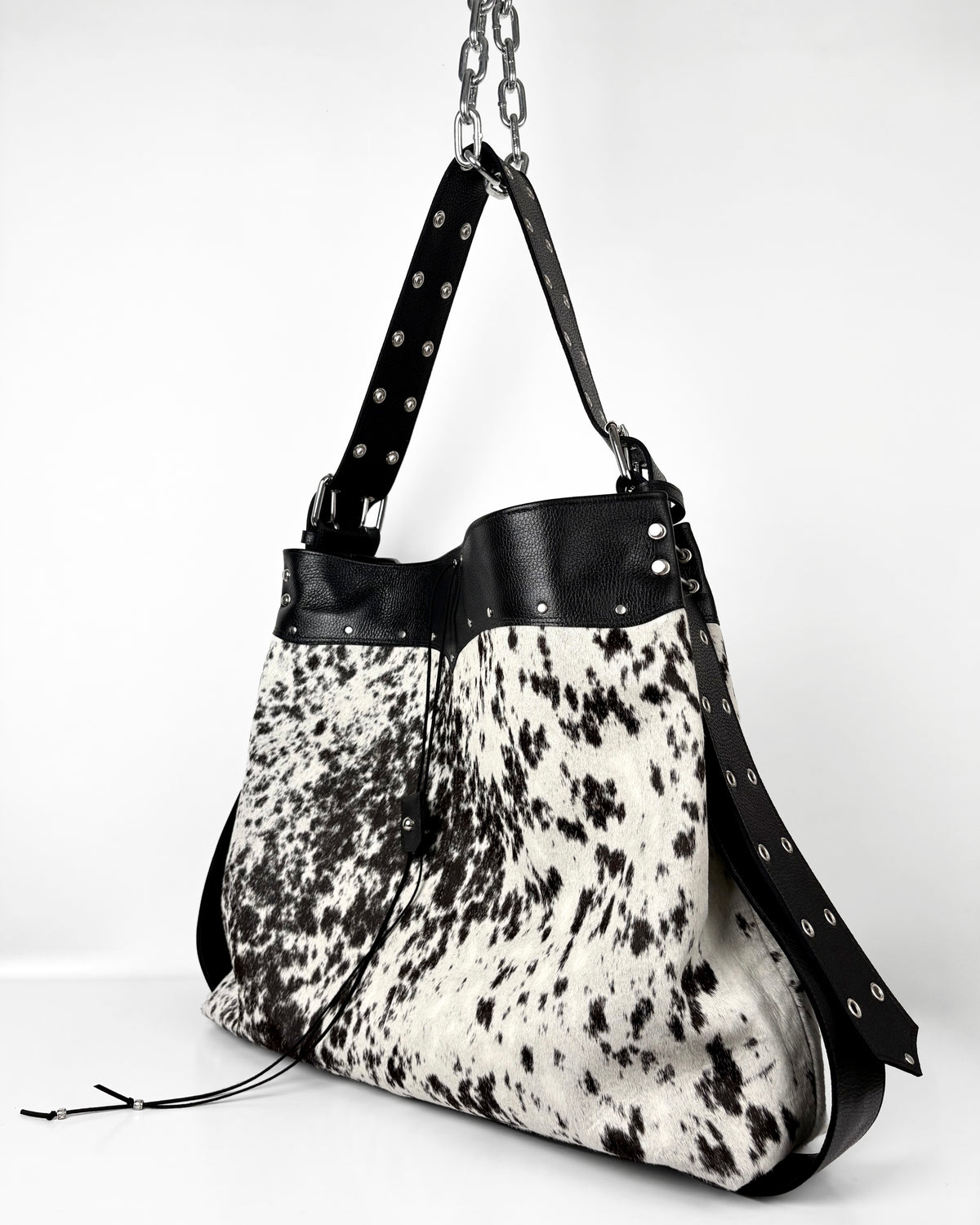 LARGE SPOTTED COWHIDE TRAVELLER