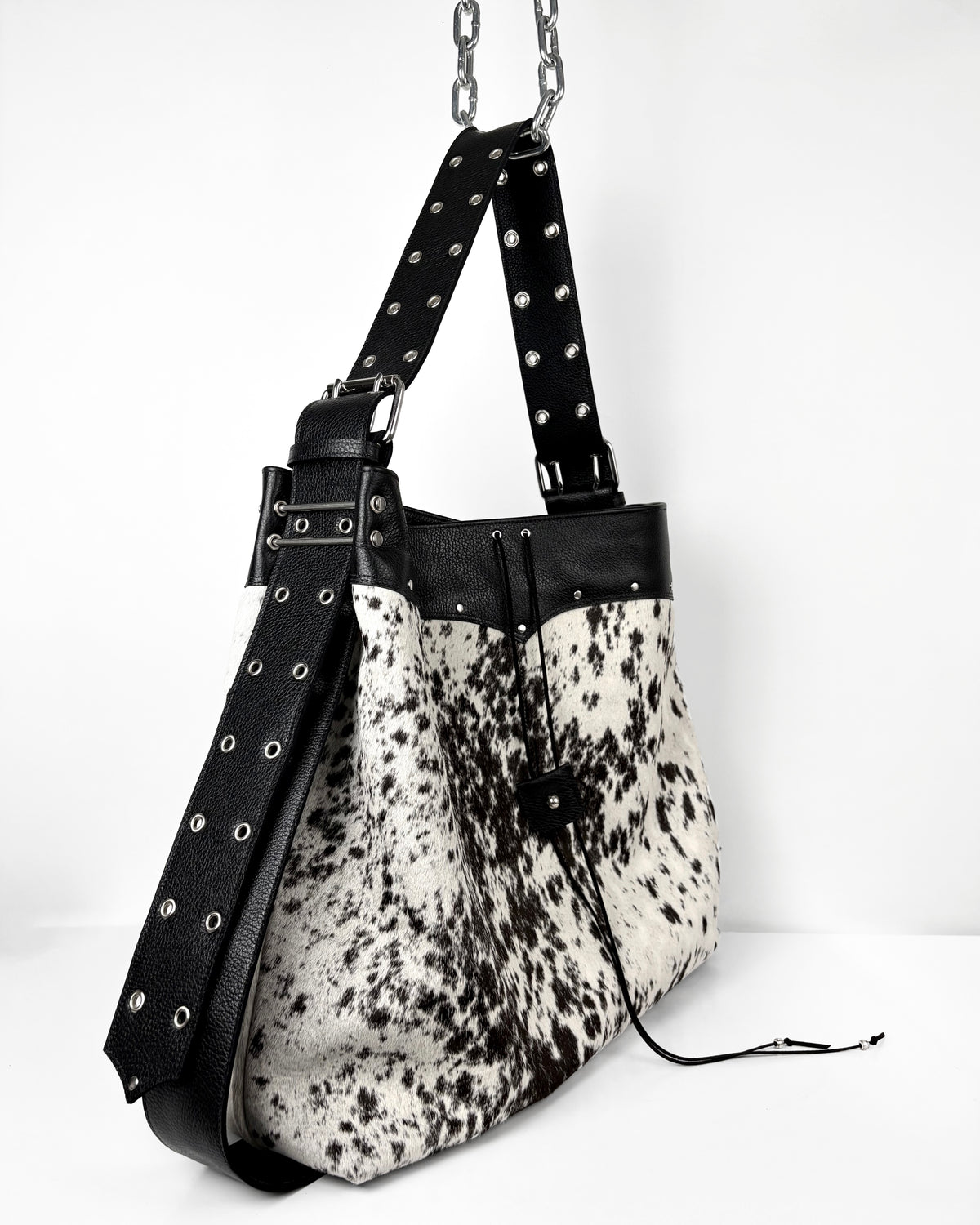 LARGE SPOTTED COWHIDE TRAVELLER
