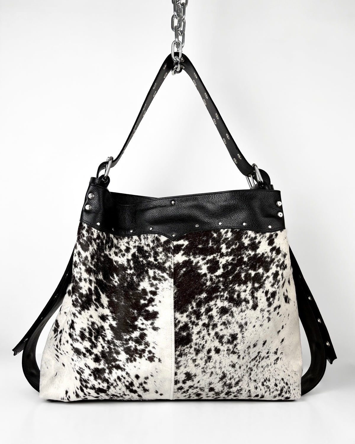 LARGE SPOTTED COWHIDE TRAVELLER