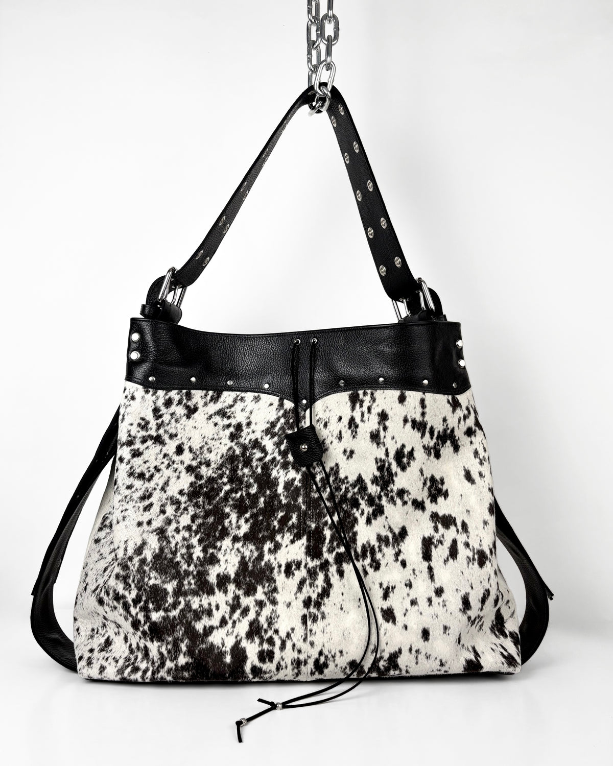 LARGE SPOTTED COWHIDE TRAVELLER