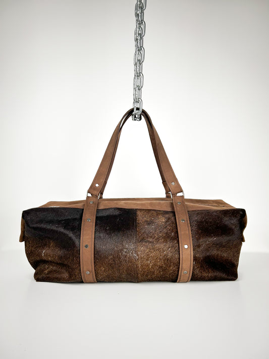 BROWN COWHIDE TRAVEL BAG