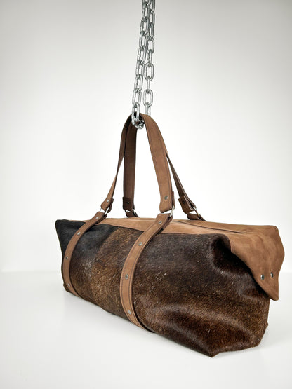 BROWN COWHIDE TRAVEL BAG