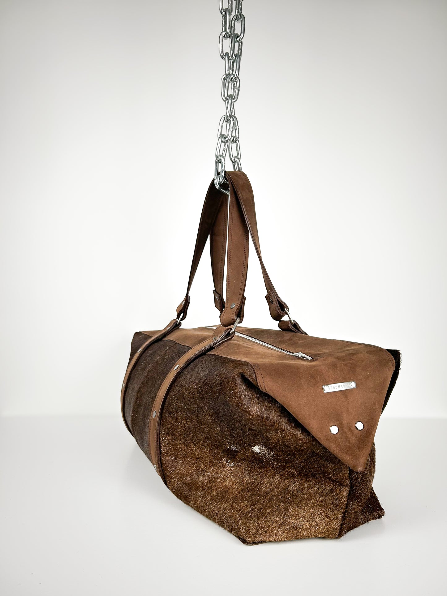 BROWN COWHIDE TRAVEL BAG